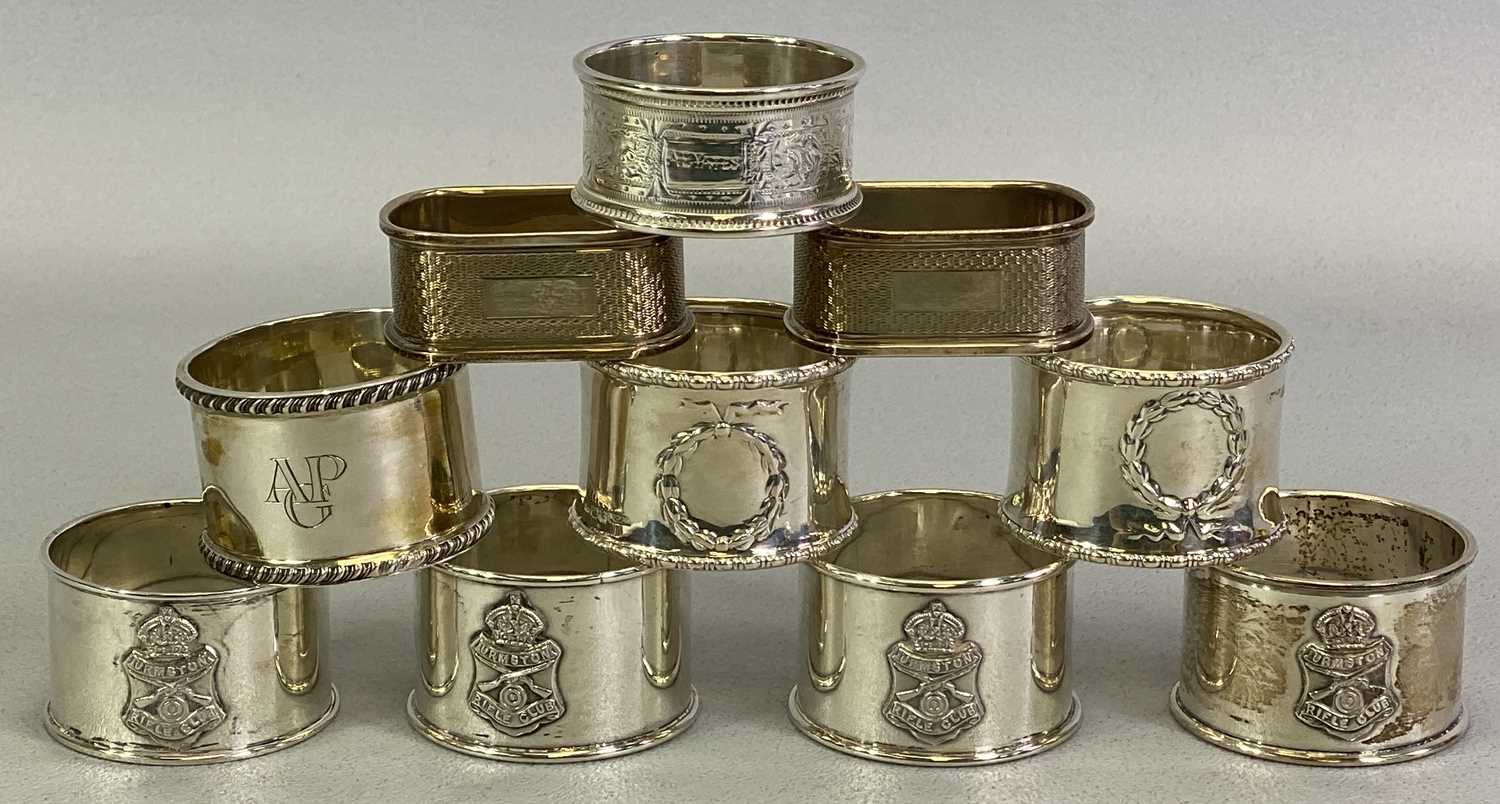 MAINLY BIRMINGHAM SILVER NAPKIN RINGS (10) - to include a set of four, having an applied crest for