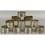 MAINLY BIRMINGHAM SILVER NAPKIN RINGS (10) - to include a set of four, having an applied crest for