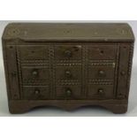 WELSH FOLK ART - carved slate doorstop in the form of a bureau chest with knobs (some absent), 16.