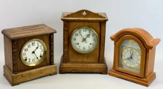 OAK CASED MANTEL CLOCK - circular white enamel dial with black Arabic numerals, 35cms H, 26cms W,