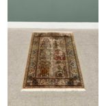 G H FRITH KASHMIRI SILK RUST RECTANGULAR RUG - six central panels with patterned borders and