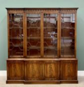 GOOD REPRODUCTION MAHOGANY BREAKFRONT BOOKCASE - having a decorative cornice over four astragal