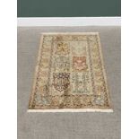 G H FRITH KASHMIRI SILK ROSE RECTANGULAR RUG - six central panels with patterned borders and