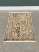 G H FRITH KASHMIRI SILK ROSE RECTANGULAR RUG - six central panels with patterned borders and