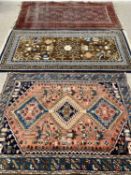 EASTERN STYLE RUGS (3) - to include a blue and brown ground Indian example with "Tibetan Refugee