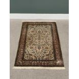 G H FRITH KASHMIRI SILK CREAM RECTANGULAR RUG - busy central floral design with patterned borders