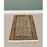 G H FRITH KASHMIRI SILK CREAM RECTANGULAR RUG - busy central floral design with patterned borders