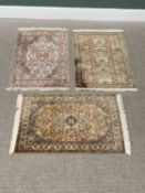 G H FRITH KASHMIRI SILK RECTANGULAR RUGS (3) - all having various patterned centres and borders with