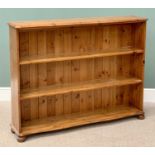 MODERN PINE SERPENTINE FRONT BOOKCASE - with fixed interior shelving, 108cms H, 139cms W, 29cms D