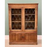 VINTAGE OAK BOOKCASE - Priory style having twin upper leaded lattice glazed doors and interior