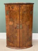 GOOD BURR WALNUT BOW FRONTED TWO DOOR WALL HANGING CUPBOARD - having fancy brass escutcheons and