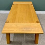 LARGE MODERN OAK DINING TABLE, having two additional leaves on substantial block corner supports,