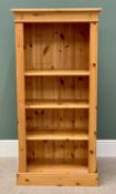 MODERN PINE OPEN BOOKCASE, having reeded front detail, fixed interior shelves, on a plinth base,