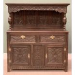 ANTIQUE CARVED OAK BUFFET SIDEBOARD, the top with leaf detail to the four panel back and canopy on