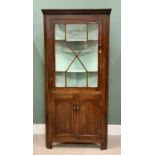 ANTIQUE OAK ONE-PIECE STANDING CORNER CUPBOARD, having an eight-pane astragal glazed upper door with