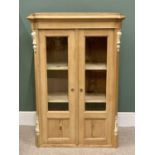 VINTAGE STRIPPED PINE TWO DOOR CUPBOARD, shaped top moulding and decorative applied corbels to the