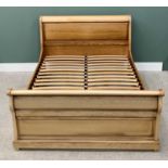 MODERN LIGHT OAK SLEIGH-TYPE BED TO TAKE A KING SIZE MATTRESS, 110cms max. H, 165cms W, 222cms