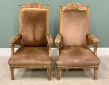 VINTAGE OAK SALON ARMCHAIRS - A PAIR, with carved detail to the crest rail, brown dralon