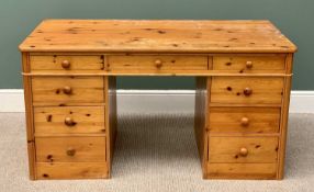 REPRODUCTION PINE TWIN PEDESTAL DESK, having nine opening drawers, 74cms H, 140cms W, 70cms D