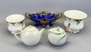 T F & SONS LTD PHOENIX WARE TWO HANDLED BOWL of shaped oval form, enamelled floral decoration and