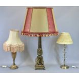 FANCY TABLE LAMPS (3) - including cherub decorated brass effect example with reeded column, 63cms