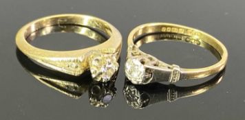 VINTAGE SOLITAIRE DIAMOND RINGS (2) - an 18ct gold and platinum example, the round cut stone