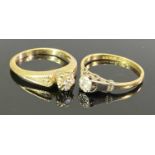 VINTAGE SOLITAIRE DIAMOND RINGS (2) - an 18ct gold and platinum example, the round cut stone