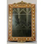 A FRENCH RECTANGULAR TEAK FRAMED WALL MIRROR - applied with ormolu mounts and porcelain panels,