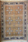 ORIENTAL HAND KNITTED RED GROUND RUG - 177 x 126cms