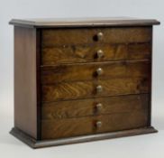 WALNUT SPECIMEN CHEST - of 6 drawers, each having a divided interior and brass knob, 30cms H, 35.