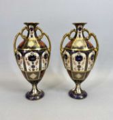POSSIBLY COPY ROYAL CROWN DERBY TWIN HANDLED VASES, A PAIR - Pattern No 1128, heavily gilded with