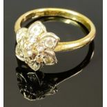18CT GOLD DIAMOND FLORAL CLUSTER RING - the stones set in a tiered arrangement and mounted, in