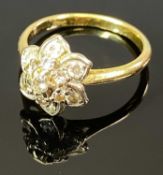 18CT GOLD DIAMOND FLORAL CLUSTER RING - the stones set in a tiered arrangement and mounted, in