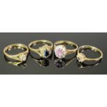 9CT GOLD DRESS RINGS (4) - one having ribbed shoulders to a coronet mount with central pink claw set
