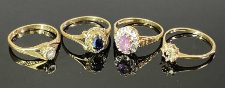 9CT GOLD DRESS RINGS (4) - one having ribbed shoulders to a coronet mount with central pink claw set