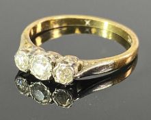 18CT GOLD & PLATINUM 3 STONE DIAMOND RING - the stones in closed edge claw mounts, 0.29cts estimated