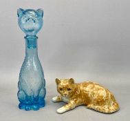 WINSTANLEY POTTERY GINGER CAT WITH GLASS EYES together with an Italian mid-century blue glass