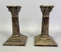 VICTORIAN LOADED SILVER CANDLESTICKS, A PAIR - Sheffield 1897, Maker Walker & Hall, Corinthian cap