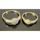 FLOWER HEAD CLUSTER DIAMOND RINGS (2) - the larger stamped '18ct plat' having nine small diamonds