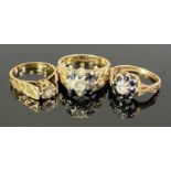 9CT GOLD RAISED SHOULDER DRESS RINGS (3) - one having a solitaire diamond in a floral illusion
