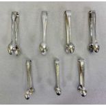 SHEFFIELD SILVER SUGAR TONGS - a collection of seven, all having individual bright cut and other
