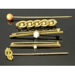15CT GOLD STAMPED BAR BROOCHES & A STICK PIN - one brooch set with a single oval opal, claw