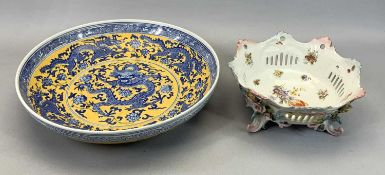 LARGE CHINESE CIRCULAR BOWL, 20TH CENTURY - glazed in yellow and blue, decorated with dragons,