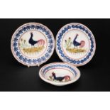 TWO SMALL LLANELLY POTTERY COCKEREL PLATES & A BOWL typically decorated by Sarah Roberts, plates
