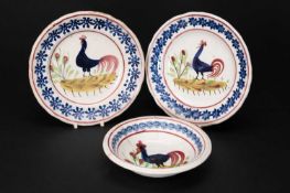 TWO SMALL LLANELLY POTTERY COCKEREL PLATES & A BOWL typically decorated by Sarah Roberts, plates