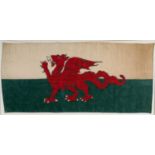 EARLY 20TH CENTURY WELSH FLAG (Y DDRAIG GOCH) with stitched edging and printed British made, 43 x