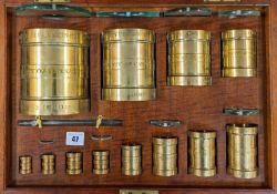 SET TWELVE VICTORIAN BRASS 'COUNTY OF CARNARVON' IMPERIAL FLUID MEASURES 1880, engraved titles, from