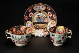 SWANSEA PORCELAIN '219' PATTERN TRIO, of London shape, richly decorated in the Japan style with