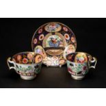 SWANSEA PORCELAIN '219' PATTERN TRIO, of London shape, richly decorated in the Japan style with