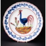 LLANELLY POTTERY COCKEREL PLATE circa 1900, continuous leaf and flower border in blue, the